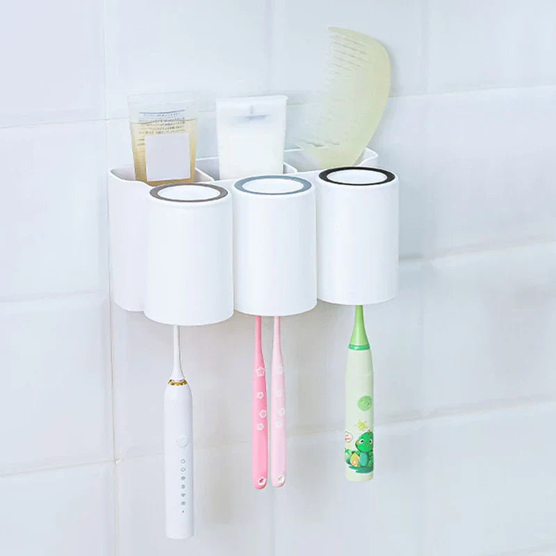 Toothbrush mouthwash cup holder with three slots and a cup