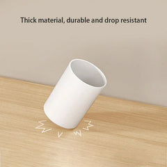 Triple toothbrush holder with integrated mouthwash cup storage