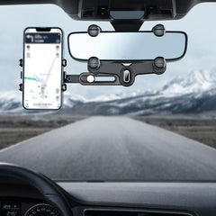 Flexible gooseneck phone holder attached to a car rearview mirror holding a smartphone with a navigation map.