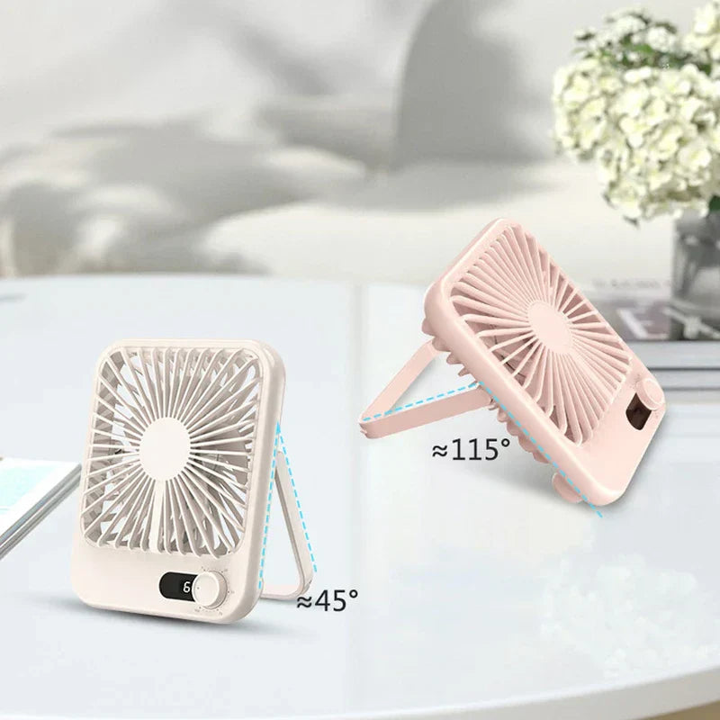 Usb Cooling Fan - Two small desk fans showing adjustable stand angles of approximately 45 and 115 degrees