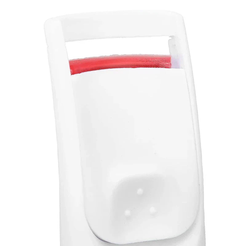 Heated Eyelash Curler - Close-up of the white curler head showing its red silicone pressing pad
