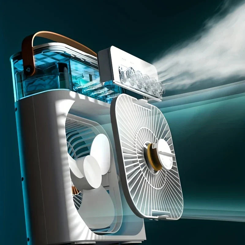 Ventilador enfriador de aire portátil - toma en ángulo de cerca de la unidad del ventilador con la rejilla frontal abierta, mostrando las aspas internas del ventilador, el tanque de agua transparente y niebla emitida desde la parte superior