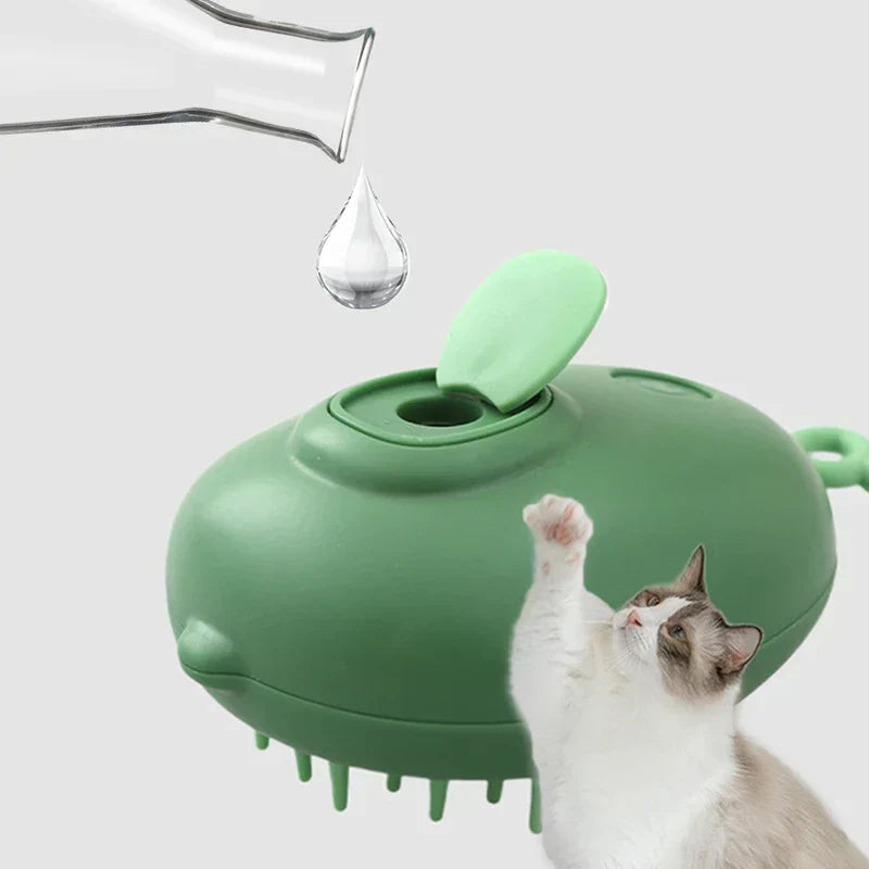 Uv Light Pet Grooming Comb - Green cat brush with a water drop falling into its fill opening, cat reaching paw up toward the brush