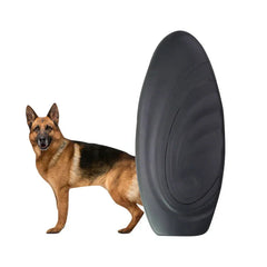 German shepherd standing next to a large gray dog repeller trainer on a white background