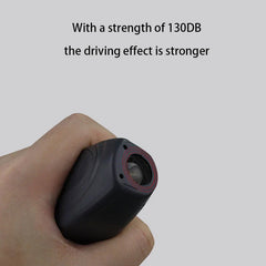 Hand gripping a dog repeller trainer showing its speaker end, with 130DB strength text above