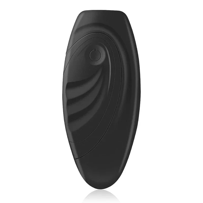 Dog Training Whistle - Matte black ergonomic oval device with centered power button and textured grip ridges