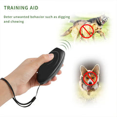 Dog Training Whistle - Hand holding black oval device emitting signal, showing images of dog behaviors marked with prohibition symbols