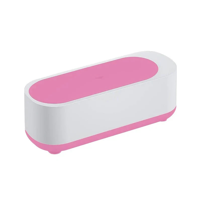 Pink and white eyeglass cleaner machine shown at an angled view on white background