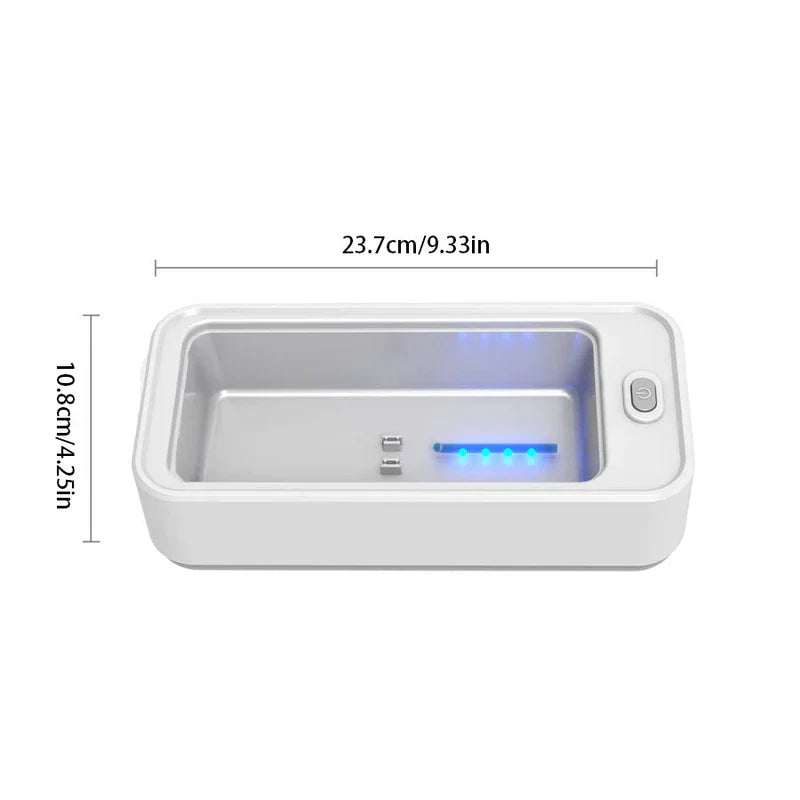 máquina limpiadora de gafas - Vista superior de un limpiador ultrasónico rectangular blanco con depósito de acero inoxidable abierto, botón de encendido a la derecha, mostrando medidas de 23,7 cm de largo y 10,8 cm de ancho.