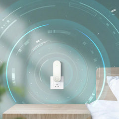 White plug-in ultrasonic pest repeller inserted in a wall outlet, with glowing teal futuristic circular graphic overlays