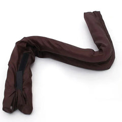Under Door Draft Stopper - Flexible brown door draft stopper bent into a U shape, with black fastener strips visible