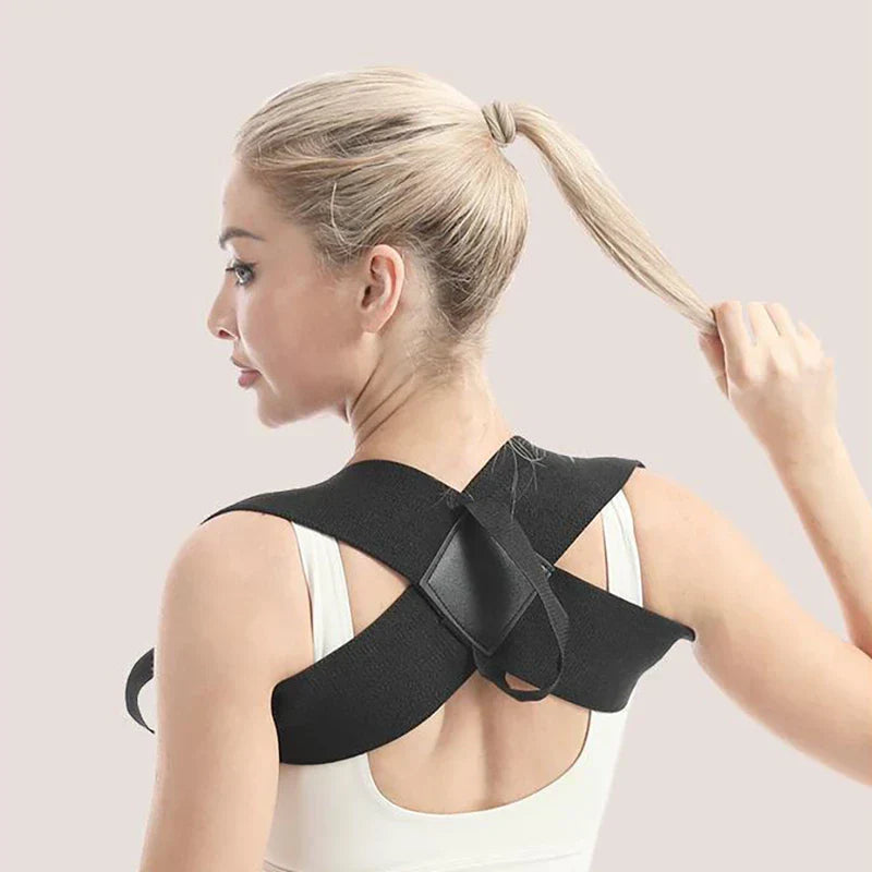 Shoulder Support Belt - Back view of a woman wearing a black posture corrector, holding her ponytail with one hand