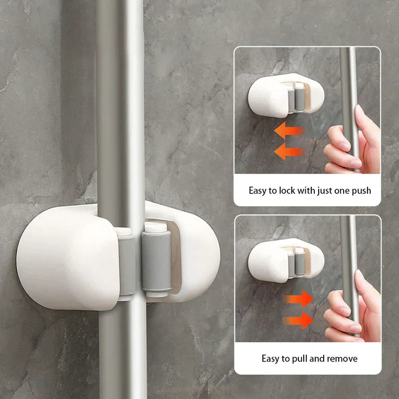 sistema de gancho sujetador - Soporte blanco de pared para trapeador sujetando un poste metálico, con dos diagramas insertados que muestran las acciones de empujar para bloquear y tirar para soltar