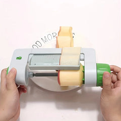 Vegetable Sheet Slicer Ribbon Cutter Tool - Two hands operating the slicer to cut a cored apple into wide sheets over a plate