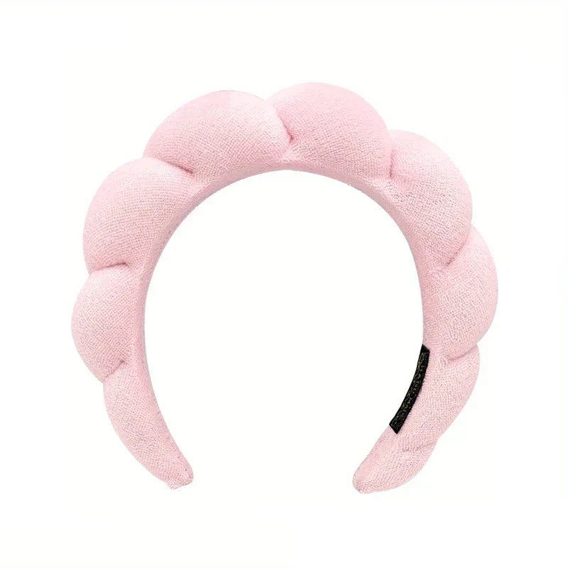 Woman wearing a velvet padded sponge headband hair hoop