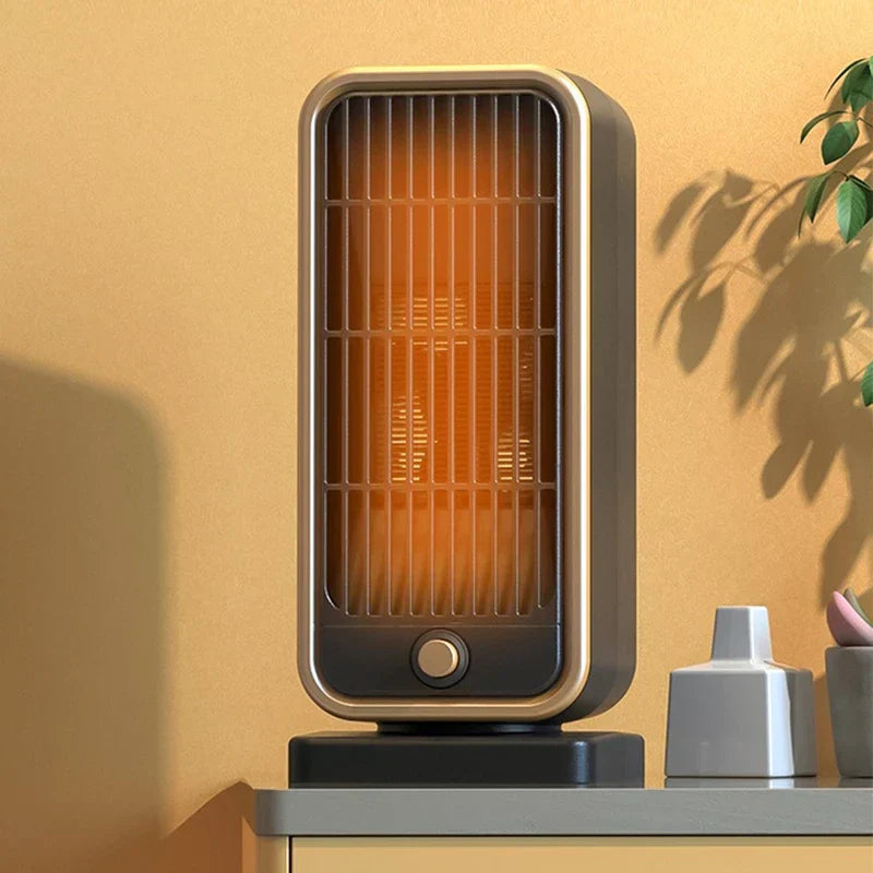 calefactor de torre - Calefactor en funcionamiento colocado sobre una mesa consola junto a pequeños artículos decorativos contra una pared beige cálida