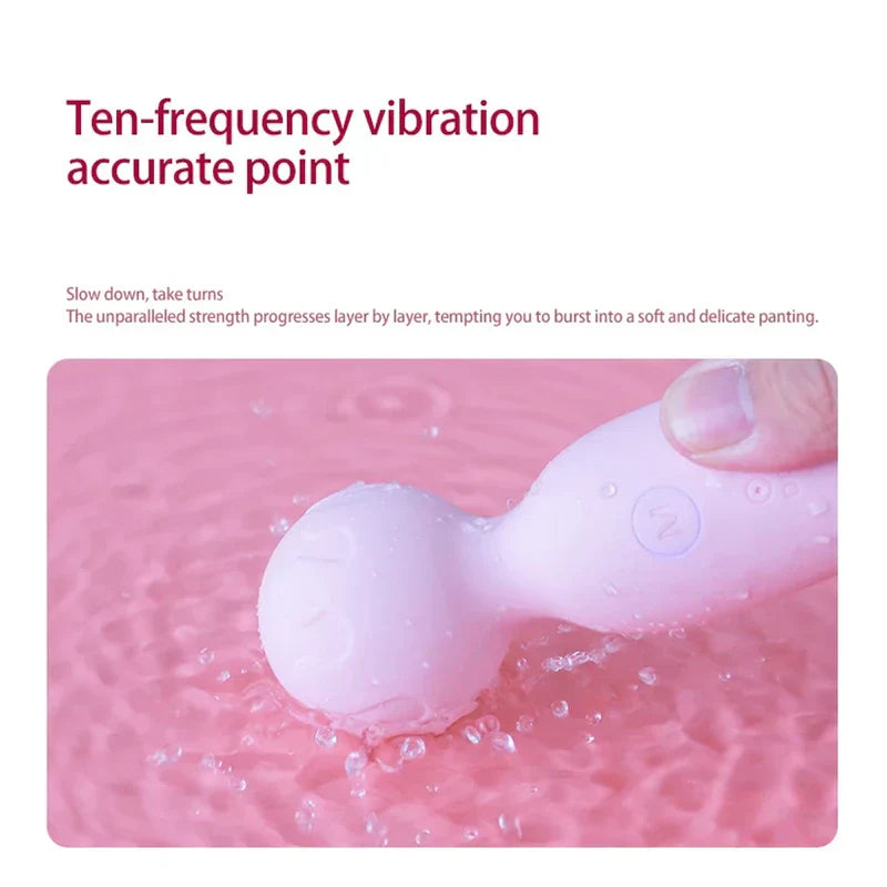 Pink waterproof massage wand submerged in water, with text indicating ten-frequency vibration settings.