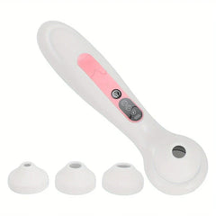 White and pink blackhead remover vacuum with three interchangeable suction heads displayed on white background