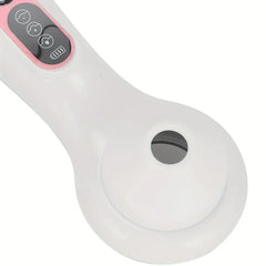 Close-up of a blackhead remover vacuum showing its circular suction opening and part of its control panel