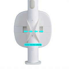 Electric Toothbrush Holder - White wall-mounted holder clamping a toothbrush handle, with cyan arrows and text 'Gravity induction clamping' showing the clamping action.