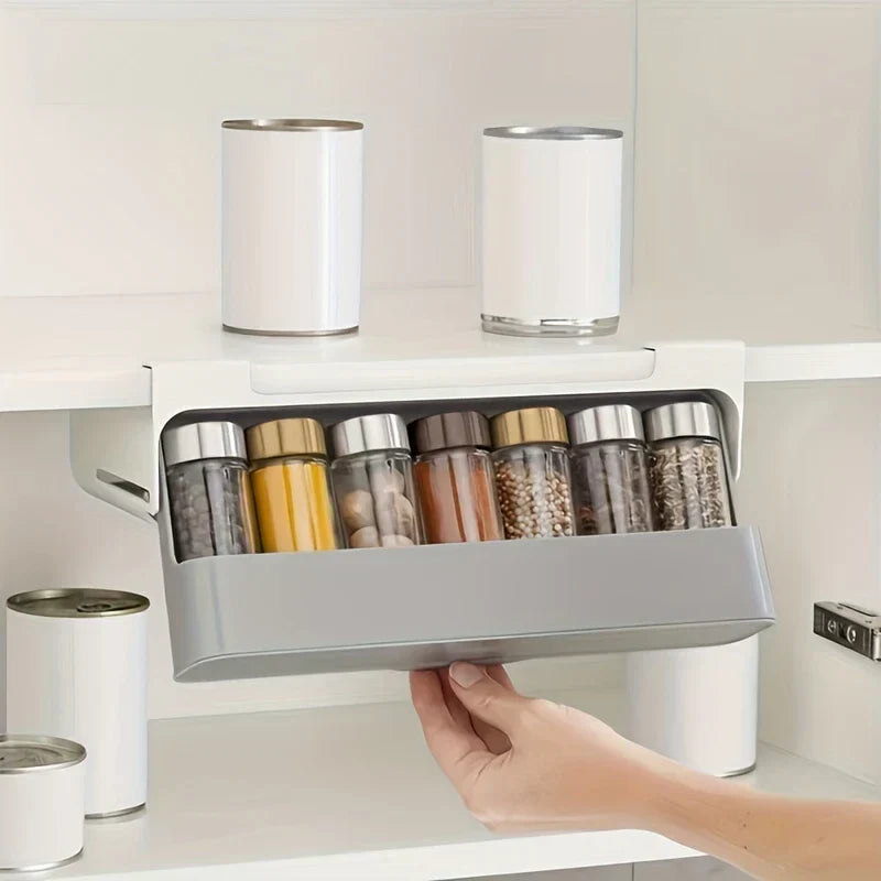Close-up of adhesive spice rack set mounted on tile backsplash