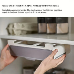 Adhesive spice rack set holding standard spice jars in a modern kitchen