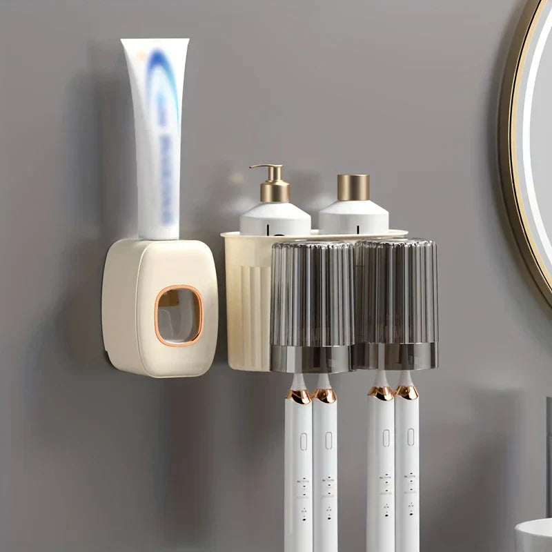 Toothbrush Holder Set - Cream wall-mounted oral care organizer installed on a gray bathroom wall, holding toothpaste, two pump bottles, and four electric toothbrushes with matching rinse cups