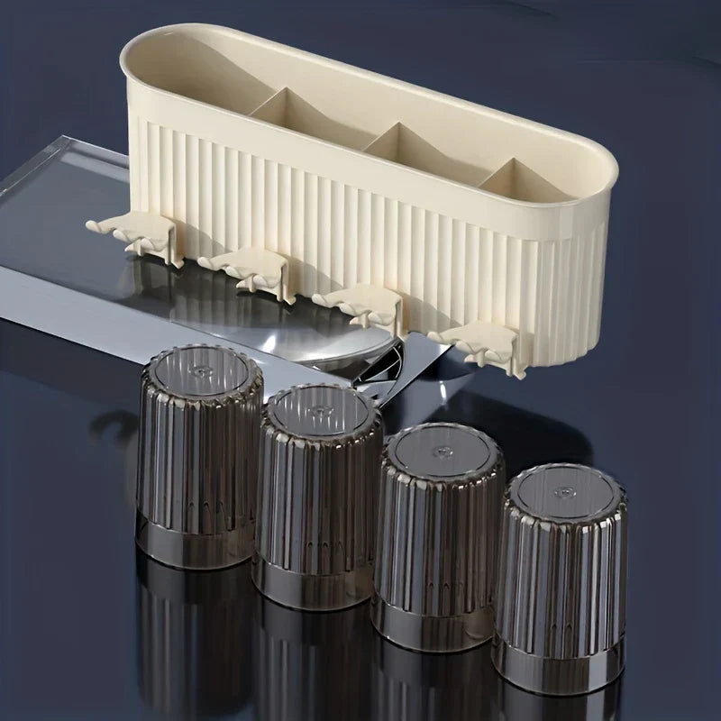 Toothbrush Holder Set - Cream fluted wall-mounted storage caddy with four hanging hooks, displayed with four matching smoked ribbed rinse cups on a dark reflective surface