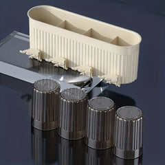 Toothbrush Holder Set - Cream fluted wall-mounted storage caddy with four hanging hooks, displayed with four matching smoked ribbed rinse cups on a dark reflective surface