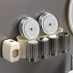 Toothbrush Holder Set - Wall-mounted beige bathroom caddy with two suction cups, four upside-down ribbed cups, and an attached cream dispenser.
