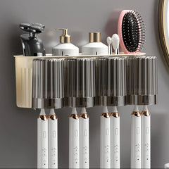 Toothbrush Holder Set - Wall-mounted beige caddy holding personal care items on its shelf, with four upside-down ribbed cups holding toothbrushes below.