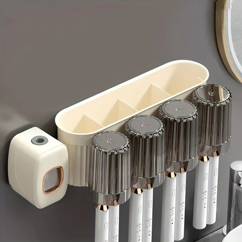 Toothbrush Holder Set - Close-up of an empty wall-mounted bathroom organizer with toothbrush slots, divided storage tray, and automatic toothpaste dispenser