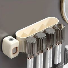 Toothbrush Holder Set - Close-up of an empty wall-mounted bathroom organizer with toothbrush slots, divided storage tray, and automatic toothpaste dispenser