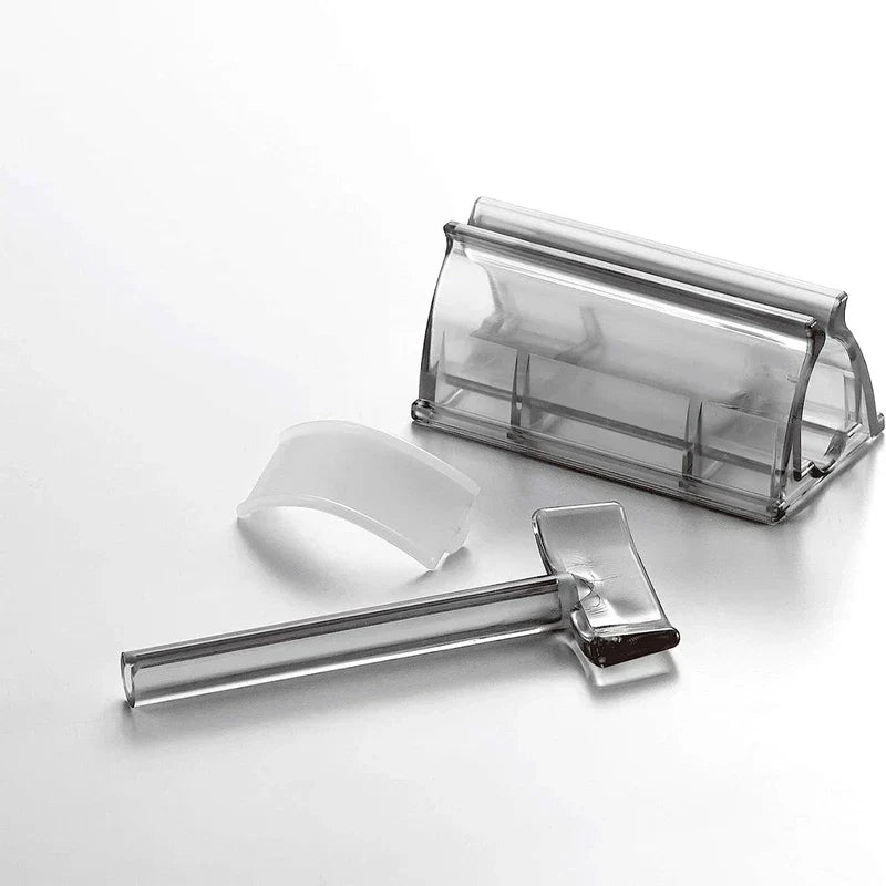 Close-up of the toothpaste dispenser squeezer nozzle