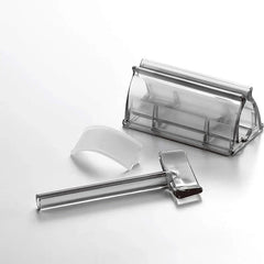Close-up of the toothpaste dispenser squeezer nozzle