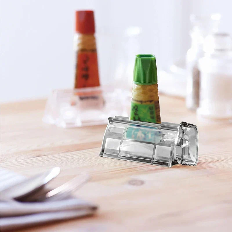 Toothpaste tube inserted into the wall mount dispenser