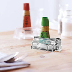 Toothpaste tube inserted into the wall mount dispenser