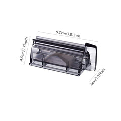 Wall Mount Toothpaste Dispenser - Smoky transparent plastic tube squeezer, shown with dimension measurements against a white background