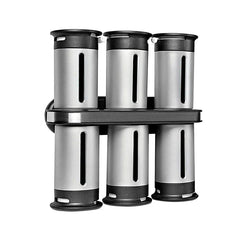 Magnetic Spice Rack Shelf - Side angle view of two-tier rack holding six silver and black spice canisters with empty view windows