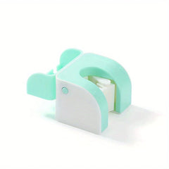Mop And Broom Holder - Two-tone mint light green and white corner-style safety lock with locking tab open, against a plain white background.