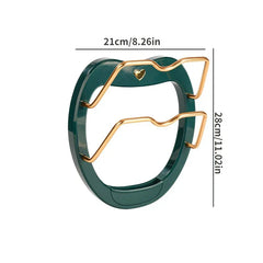 Wall Mounted Pot Lid Holder - Cat-eared wall-mounted lid rack in dark green with gold accents, showing dimensions of 21cm width and 28cm height.