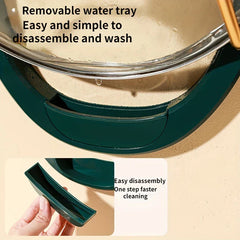 Wall Mounted Pot Lid Holder - Close-up of the rack's removable drip tray, showing water droplets from a resting lid and a hand removing the tray.