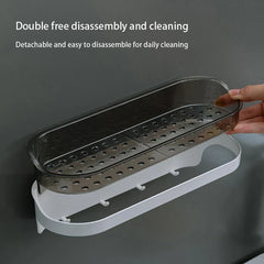 Wall Mounted Shelf - Hand lifting the inner perforated tray of a wall-mounted storage rack away from its outer base, showing it is detachable.