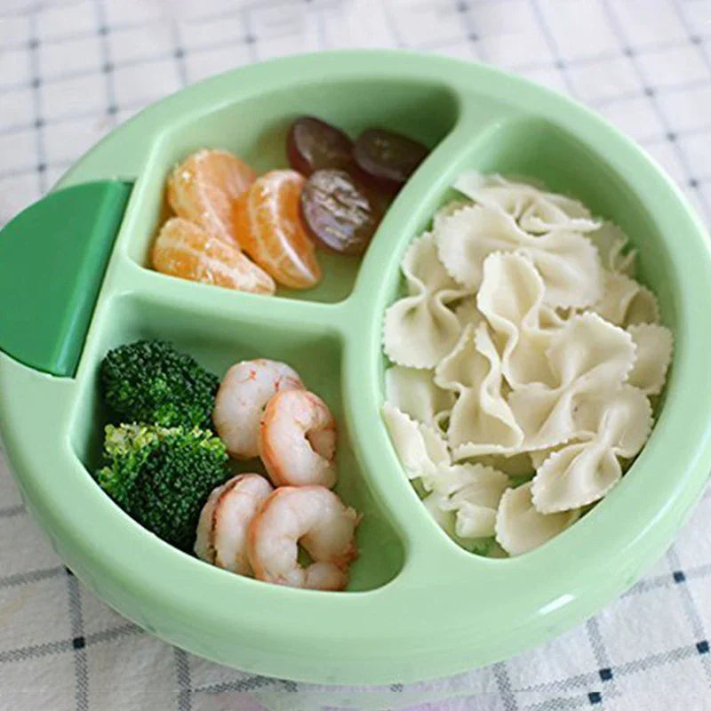 Food Warmer - Divided serving dish holding prepared pasta, shrimp, broccoli, and fresh fruit portions