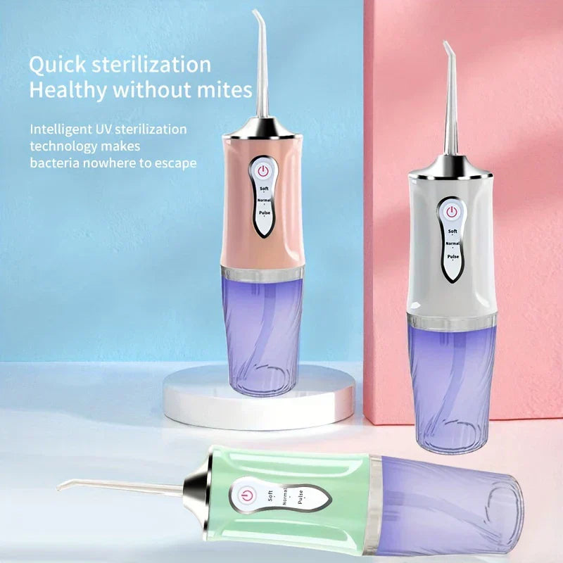 irrigador dental - Primer plano del irrigador dental con compartimento de sanitización UV y boquillas
