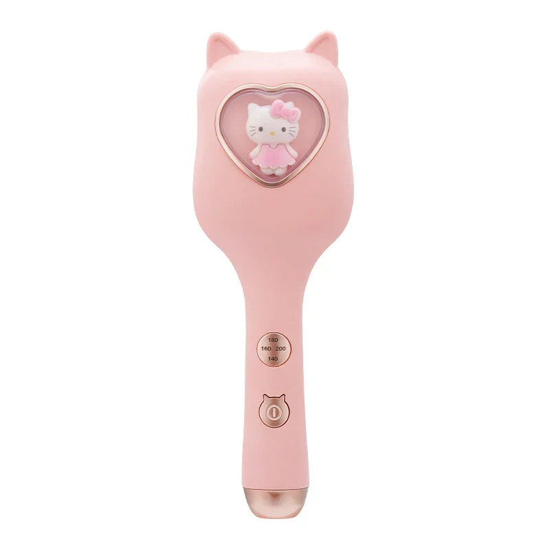 Pink Hello Kitty cat-ear handheld egg roll maker with heart-shaped decal and temperature control buttons