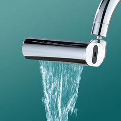 Waterfall Bathroom Faucet - Chrome waterfall faucet spout releasing a wide stream of water against a teal background