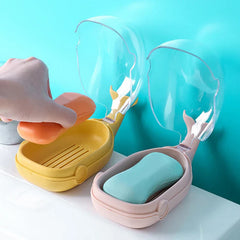 Whale shape soap dish holder near a bathtub