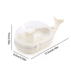 Cream whale-shaped soap dish with clear cover, showing dimension measurements on a white background