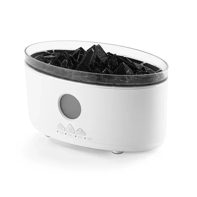 Diffuser Humidifier - Angled front-side view of oval white unit showing control panel, mountain-style interior insert, and clear top rim on a plain white background